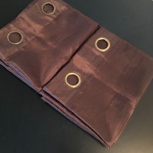Sheer brown curtain panels